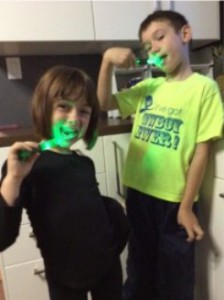 Dominic and Sophia using Firefly Ready Go toothbrush